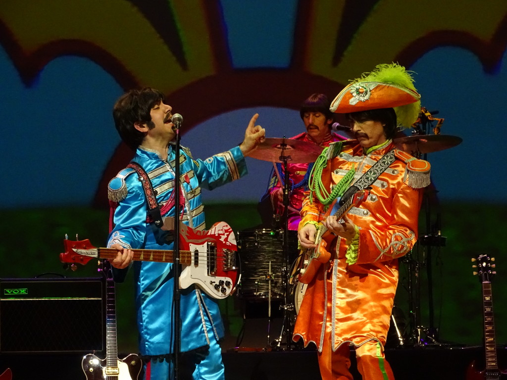 "The Fab Three" rock Sgt. Pepper.